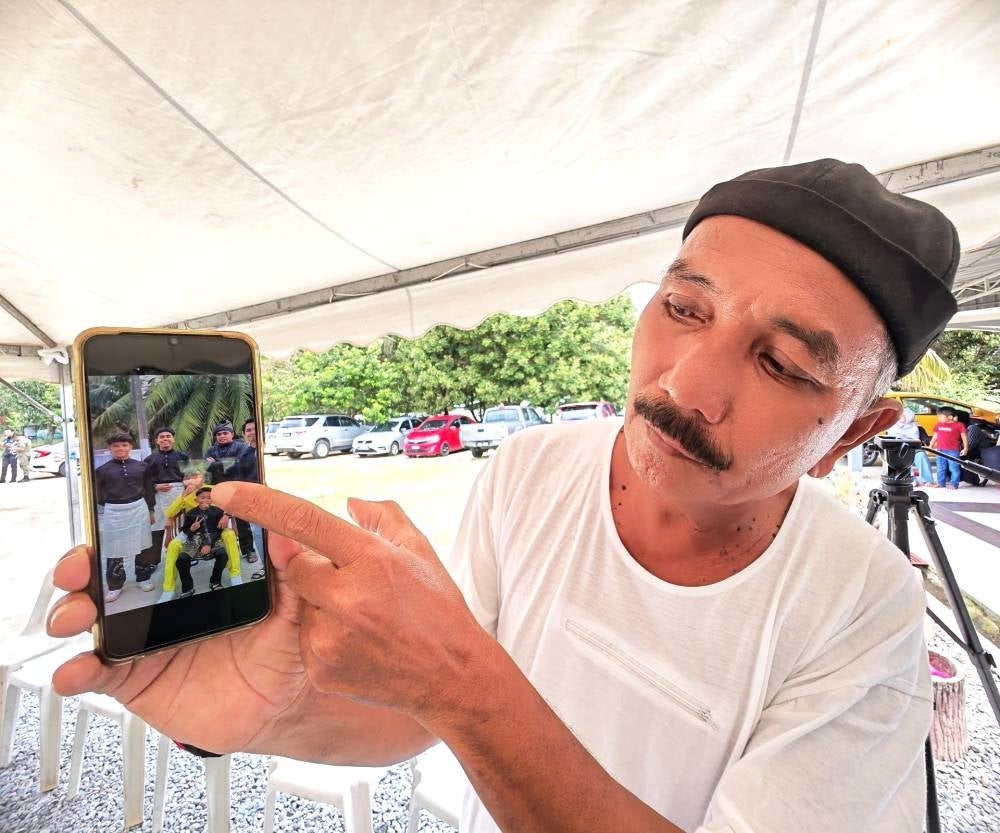 Masdi Md Isa never thought that a video received from his son Aircraftman 1 Mohd Iqmal Masdi would be last - FILE PIX 