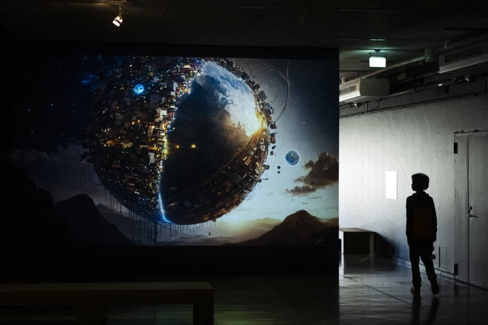 A kid walks at the Tekniska museum where an AI exhibition is showcased on June 8, 2023 in Stockholm. Photo by Jonathan Nackstrand/AFP FILE PIX