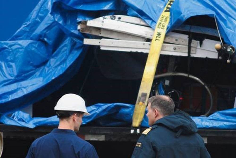 Pieces of the Titan submersible brought up to land by rescue teams. - Photo by Reuters