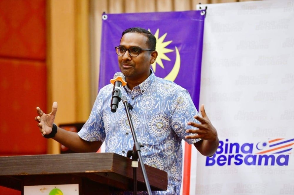 Punithan's contributions to MIC include serving as a member of the party's central working committee (CWC), as well as holding positions as the MIC Youth secretary and MIC information chief. - Photo taken from Punithan Paramsiven's Facebook