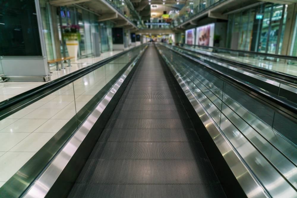 The passenger, whose identity has not been released, fell on the travelator on Thursday before her flight to Nakhon Si Thammarat in southern Thailand, the Bangkok Post reported, citing the emergency services. Photo for illustrative purposes only - 123RF