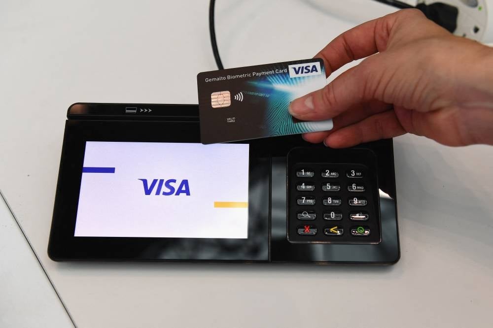 A total of seven out of 10 Malaysian consumers are now actively using contactless card payments system as part of the effort towards becoming a cashless society, said global leader in digital payment, Visa Inc. - Photo by AFP