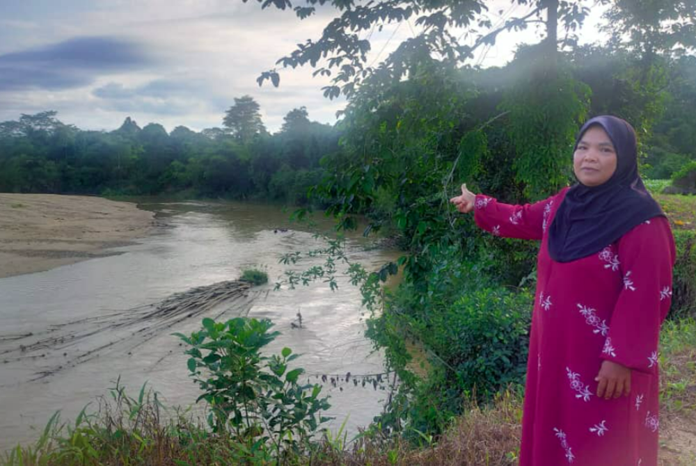 Norhaini showing the location where the seventh victim's body was found - FILE PIX 