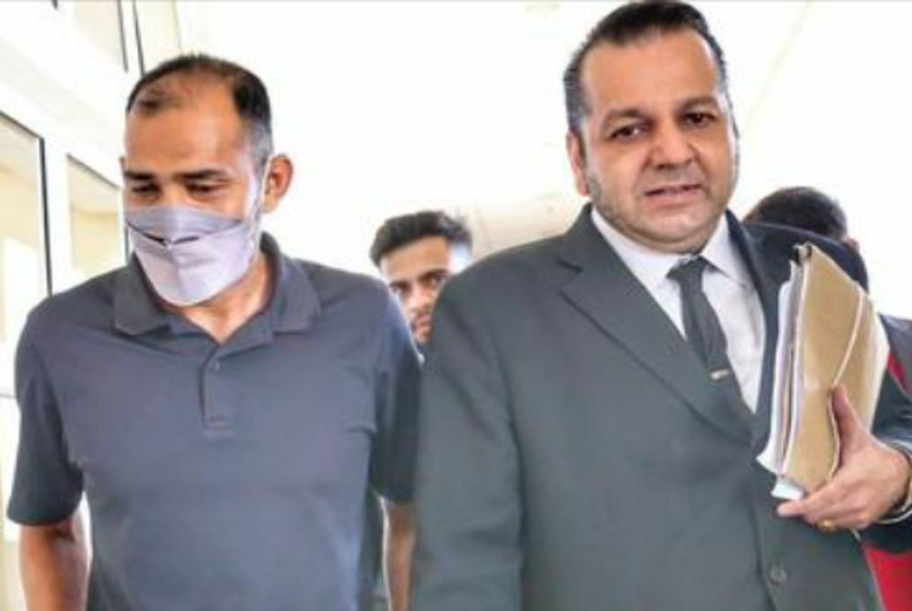 The former Perak FA player (left) was charged with trespassing into the 36-year-old woman's room at a hotel in Kelana Jaya here at 6pm last June 21. - Facebook