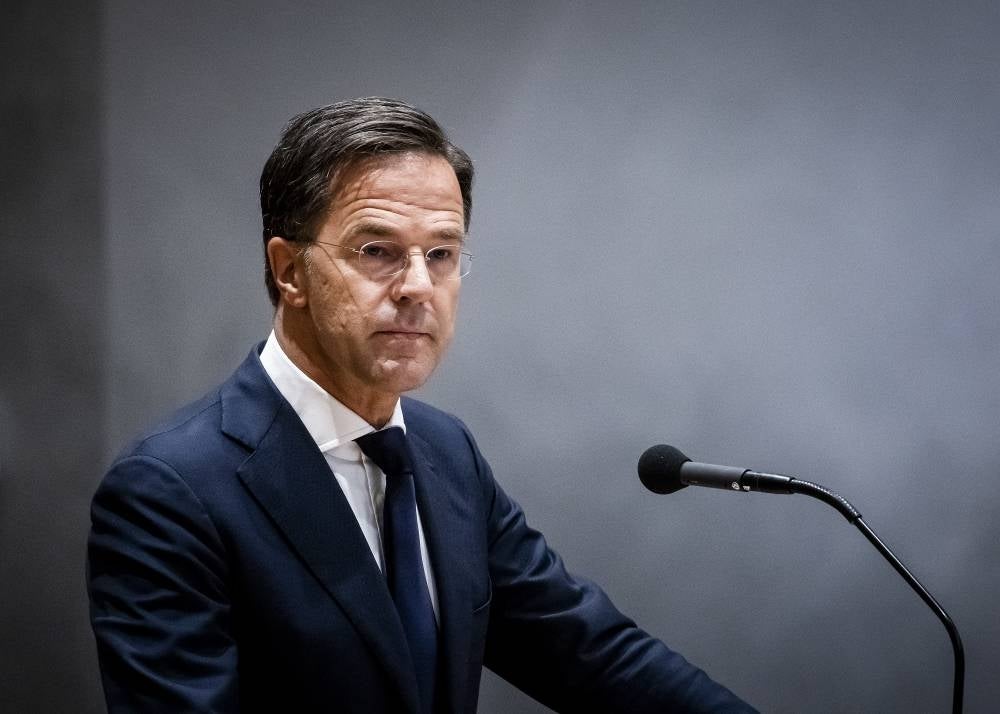 Outgoing Prime Minister Mark Rutte announces he is leaving politics during a debate in the House of Representatives following the fall of the cabinet, in The Hague on July 10, 2023. - AFP