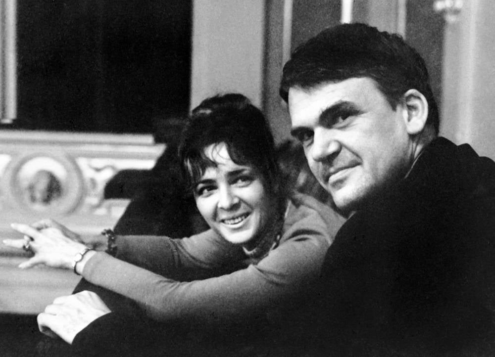 Czech writer Milan Kundera poses with his wife in Prague on October 14, 1973. - AFP PIX