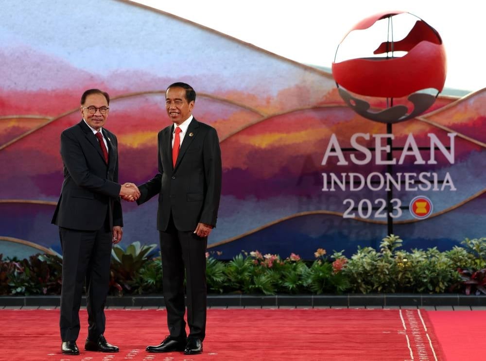 Anwar (left) with Indonesia President Joko Widodo at the 42nd Asean Summit in 2023 in the city of West Manggarai, Flores Islands, in the East Nusa Tenggara region today. Bernama pix