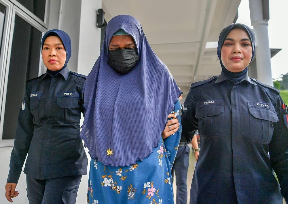 Saira Abdullah, 62, was sentenced to 12 months jail by the Selayang magistrate's court today for splashing acid on a Pakistani man last week. - Photo by Bernama