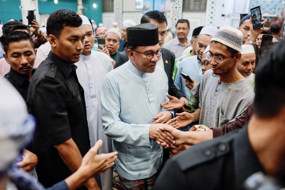 Prime Minister Datuk Seri Anwar Ibrahim joined the congregation to perform Friday prayers at the Al-Khairiyah Mosque - BERNAMA