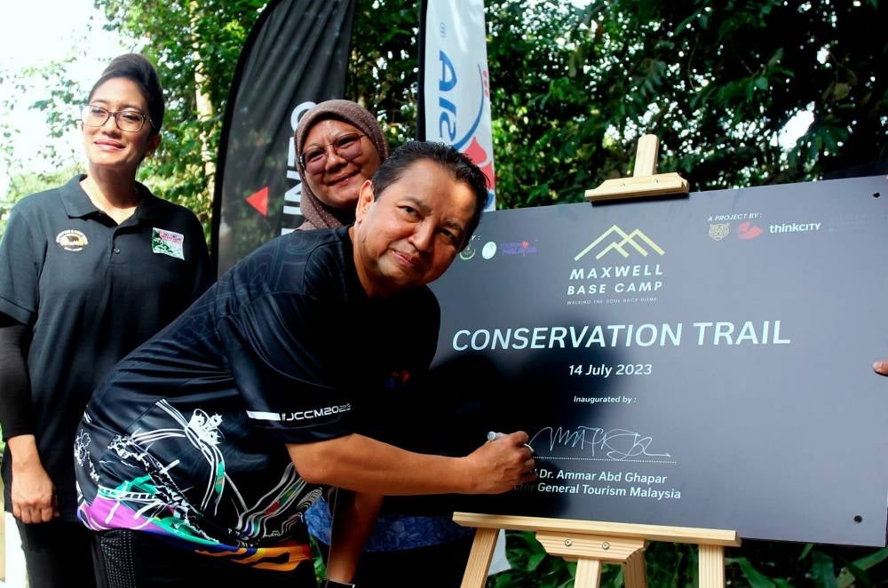 Tourism Malaysia director-general Datuk Dr Ammar Abd Ghapar (right) officiating the conservation trail launching ceremony. - Bernama PIX