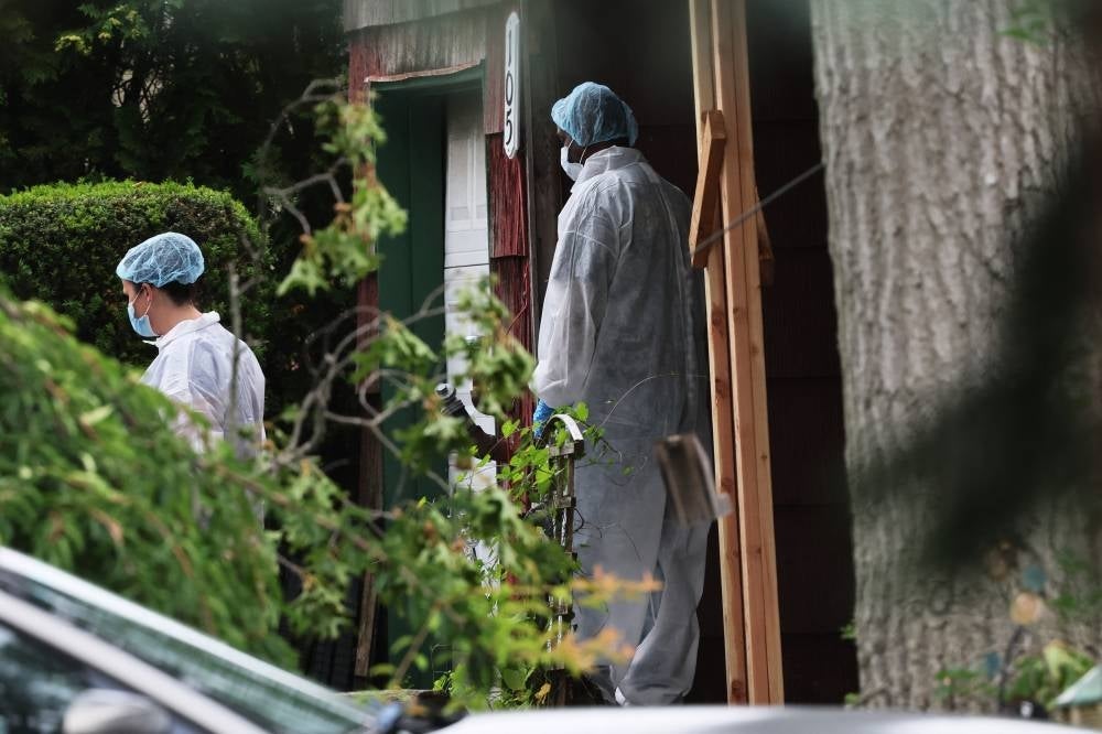 A suspect in the Gilgo Beach killings was arrested in the unsolved case tied to at least 10 sets of human remains that were discovered since 2010 in suburban Long Island. The suspect Rex Heuermann is expected to be arraigned after his arrest Thursday night. - (Photo by Michael M. Santiago / AFP)