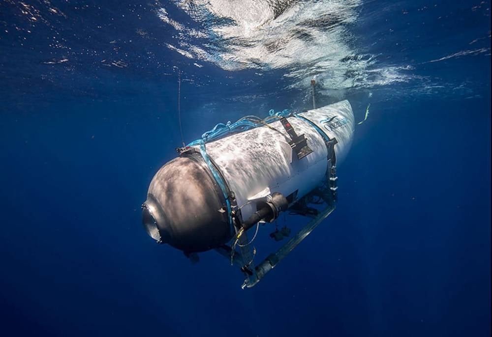 This undated image courtesy of OceanGate Expeditions, shows their Titan submersible beginning a descent. - AFP