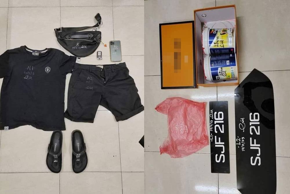 The items and clothing seized after the arrest of a teen involved in splashing red paint at a home and vehicle around Johor Bahru City.