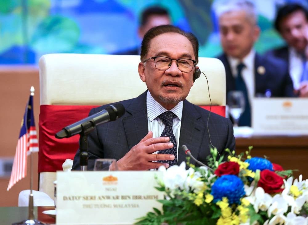 Prime Minister Datuk Seri Anwar Ibrahim delivering his speech during a courtesy call on the Chairman of the National Assembly Vuong Dinh Hue at the National Assembly Building today. - Photo by Bernama