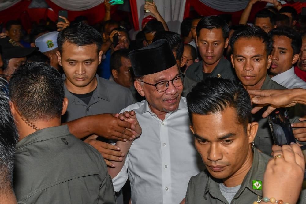 Prime Minister and PKR president Datuk Seri Anwar Ibrahim at the Madani Unity Tour and launch of the Unity Machinery in Kelantan, near Bukit Tiu, last night. - Photo by BERNAMA