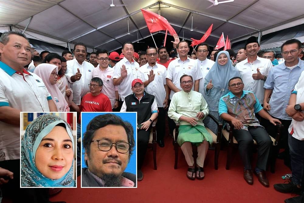 Prime Minister and PKR president Datuk Seri Anwar Ibrahim (seated, second from right) poses for a photo after the announcement of candidates from the party who would be contesting in the state elections - Thumbnail from left: Dr Kartini, Dr Mazlan