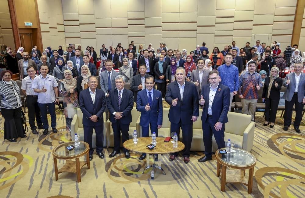 The Chief Secretary of the Ministry of Communications and Digital, Datuk Mohamad Fauzi Md Isa (front centre) poses with the participants of the 'Converged Telecommunications Policy and Regulations (CTPR) 2023 Master Class's after officiating the five-day course starting today.
Also with him is the Chairman of the Malaysian Communications and Multimedia Commission (MCMC), Tan Sri Mohamad Salim Fateh Din (front two, right). Photo by Bernama