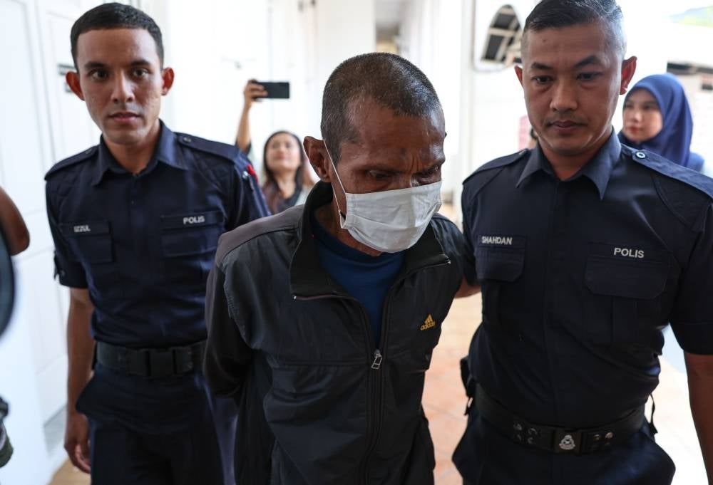 Mohamad Shaharudin was accused of intentionally causing the death of Zaharah Khalid, at a house in Kampung Pasir Panjang Laut, Seri Manjung, Manjung at about 8pm on May 3, 2020, under Section 302 of the Penal Code that carries the death penalty. - Photo by Bernama