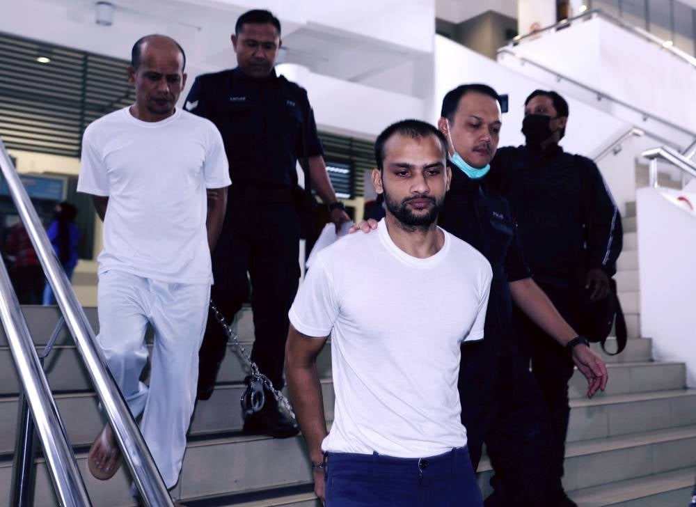 Myanmar national Sua Lay, 38, and Indian national Gurpreet Singh, 28, were sentenced after they failed to raise a reasonable doubt at the end of their defence. - Photo by Bernama