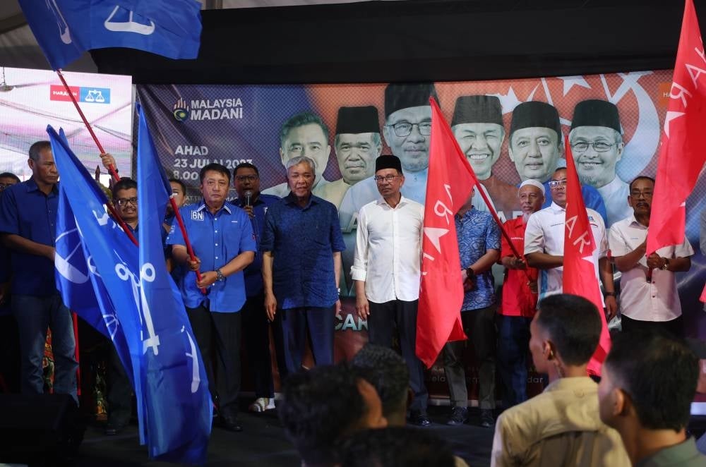 The Unity Coalition's top leadership which includes PH Chairman Datuk Seri Anwar Ibrahim and BN Chairman Datuk Seri Ahmad Zahid Hamidi.