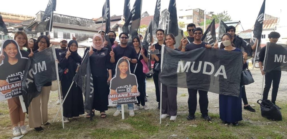 Among the supporters stood Nicole Ting, Melanie's elder sister, who expressed her hope for Muda to grow stronger as a party in the future. - Photo by AYESHA SHEIK MAZRUL