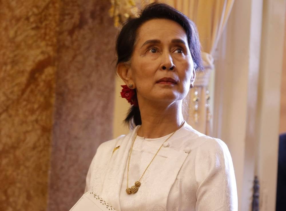 Myanmar civilian leader Aung San Suu Kyi, who has been in detention since she was ousted in a 2021 military coup, has been pardoned in a junta amnesty of more than 7,000 prisoners to mark Buddhist Lent, state media said on August 1, 2023. (Photo by KHAM / POOL / AFP)