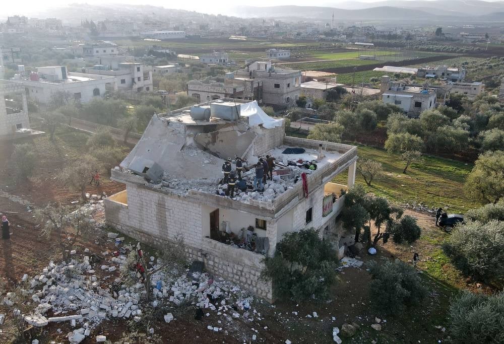 An aerial view shows the house in which the leader of Islamic State group Amir Mohammed Said Abd al-Rahman al-Mawla, aka Abu Ibrahim al-Hashimi al-Qurashi died, during a raid by US special forces, in the town of Atme in Syria's northwestern province of Idlib, on Feb 4, 2022. - (Photo by AAREF WATAD / AFP)