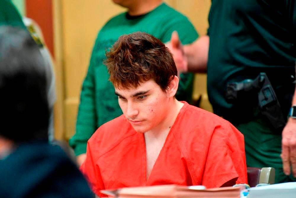 In this file photo taken on April 27, 2018, Florida school shooting suspect Nikolas Cruz looks down during a hearing in Fort Lauderdale, Florida. - Photo by AFP