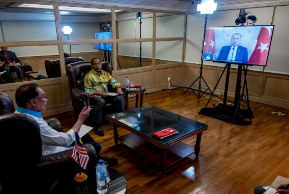 Turkish President Recep Tayyip Erdogan had a video call with Malaysian Prime Minister Datuk Seri Anwar Ibrahim (left) to discuss bilateral relations between their countries. - Facebook