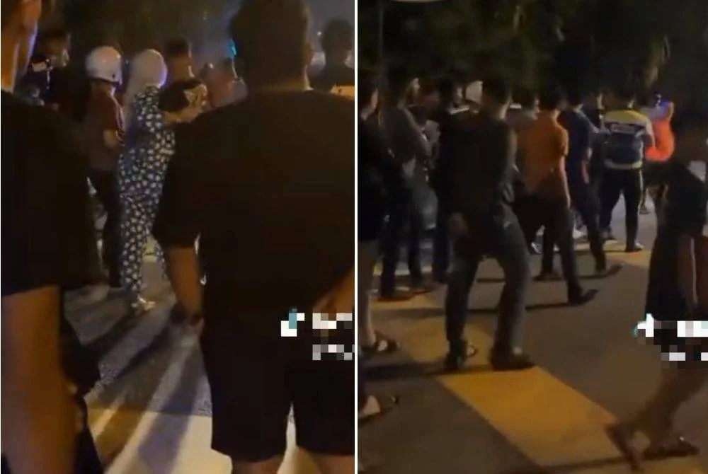 Screen capture of a viral video claiming that there was an incident of police beating an arrested man in Op Samseng in Jalan Jelapang, Ipoh on Sunday. – Photo by Sinar