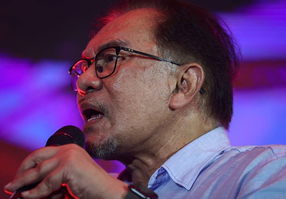 Prime Minister Datuk Seri Anwar Ibrahim reiterated the Unity Government's commitment to end hardcore poverty this year, even if additional funds are required for the purpose. - Photo by Bernama
