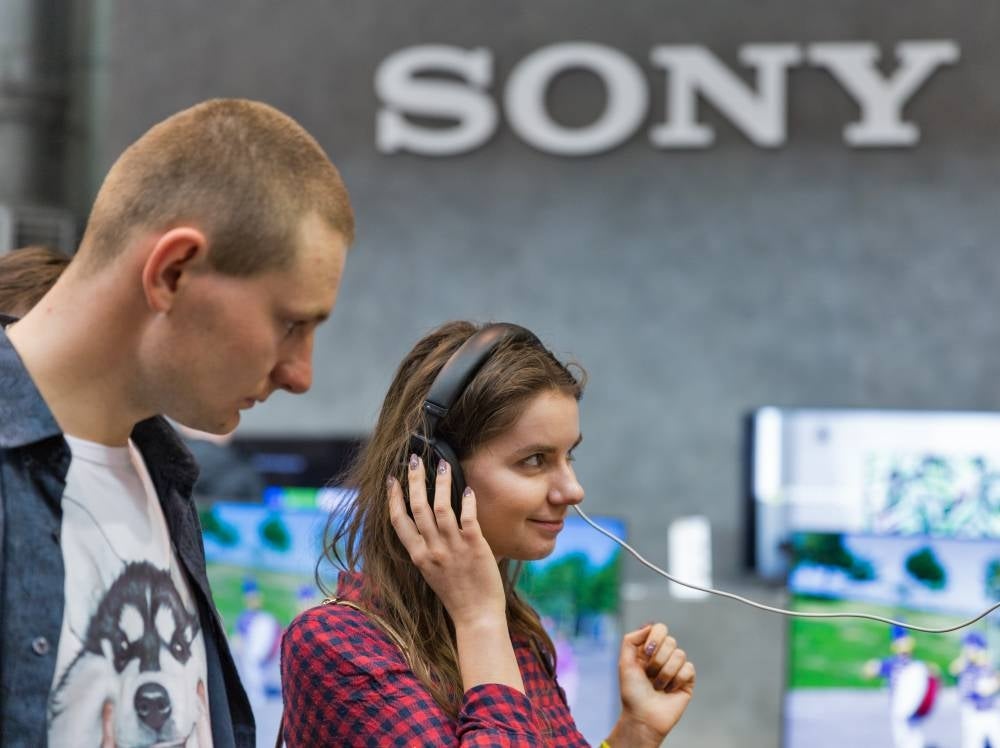Visitors checking out Sony headphones at the electronics manufacturer company booth during CEE 2019, the largest electronics trade show of Ukraine in Tetra Pack EC Kiev. (Photo from 123rf) 