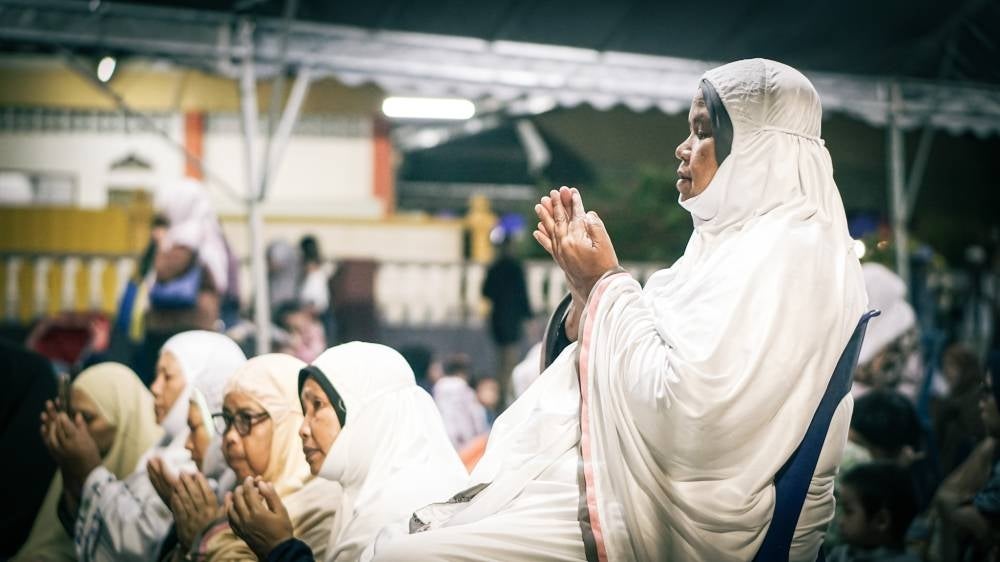 Women of all ages also attended the prayer at the Aug 8 mega rally. - Photo by ZAIDI AZMI