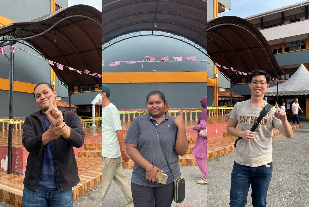 Shahrizal Zainal (left), Tholaashini Kamalanathan (middle) and Aaron Loo came to cast their vote for N49 state assembly Sungai Kandis seat at Sekolah Kebangsaan Taman Sri Andalas.
