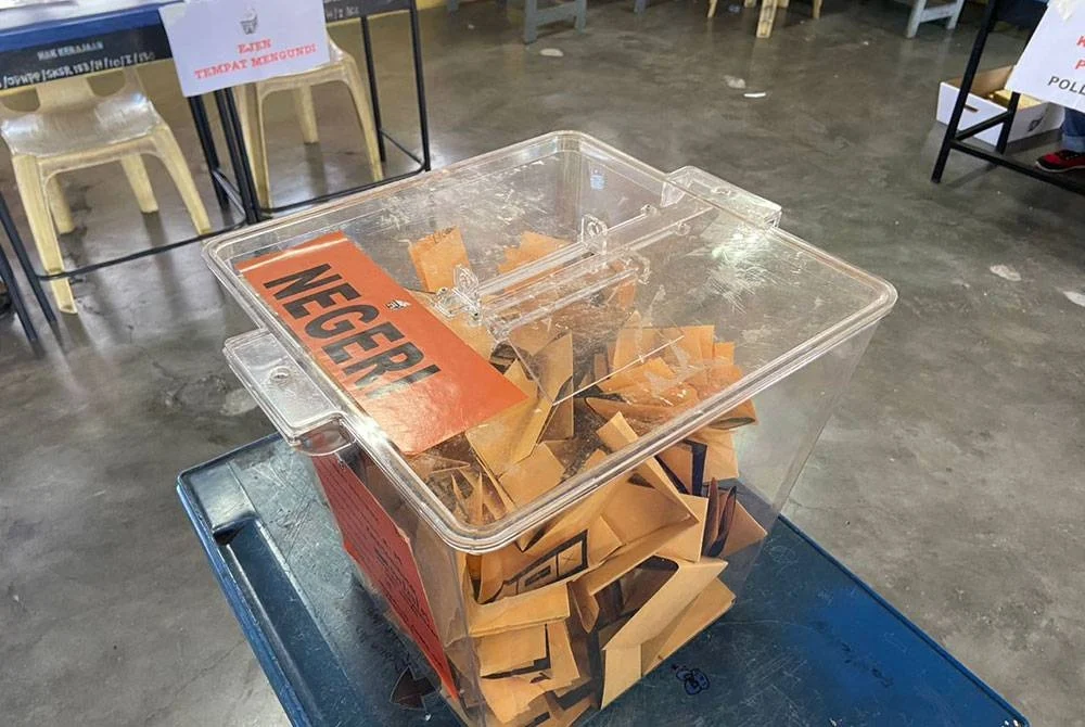 The unsealed ballot box on channel 15 at Sekolah Menengah Seri Relau Jalan polling for the Paya Terubong today.