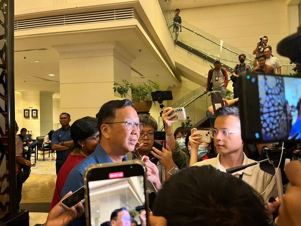 Dominic speaking to the media at a hotel in Shah Alam.