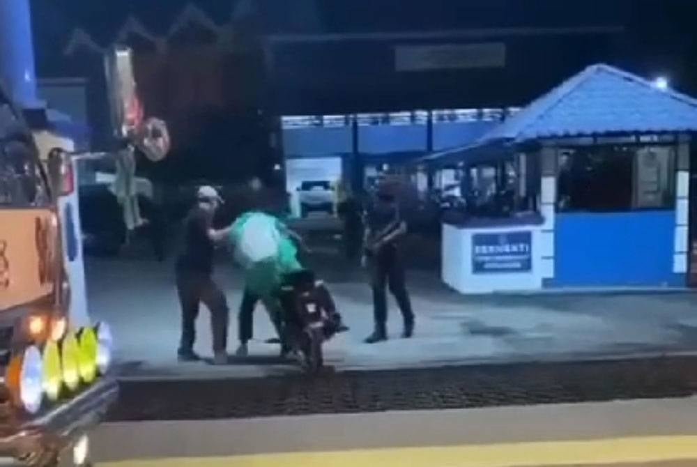 A screenshot of the incident on social media where an individual can be seen being beaten in front of a police station - FILE PIX 