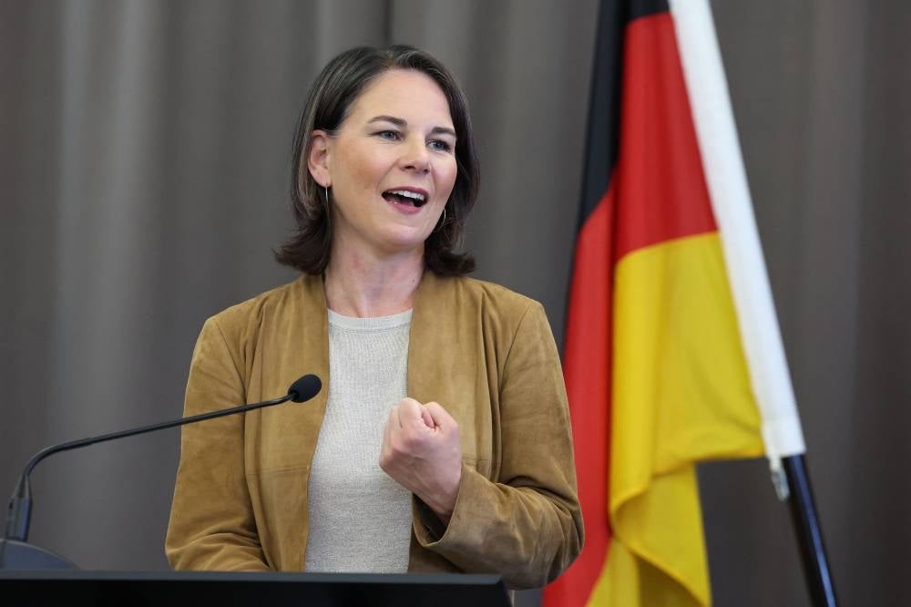 German Foreign Minister Annalena Baerbock's plane early on Tuesday morning had to turn around shortly after taking off from Abu Dhabi and return to the United Arab Emirates for a second time as her plane continued to experience mechanical problems. - Photo by AFP