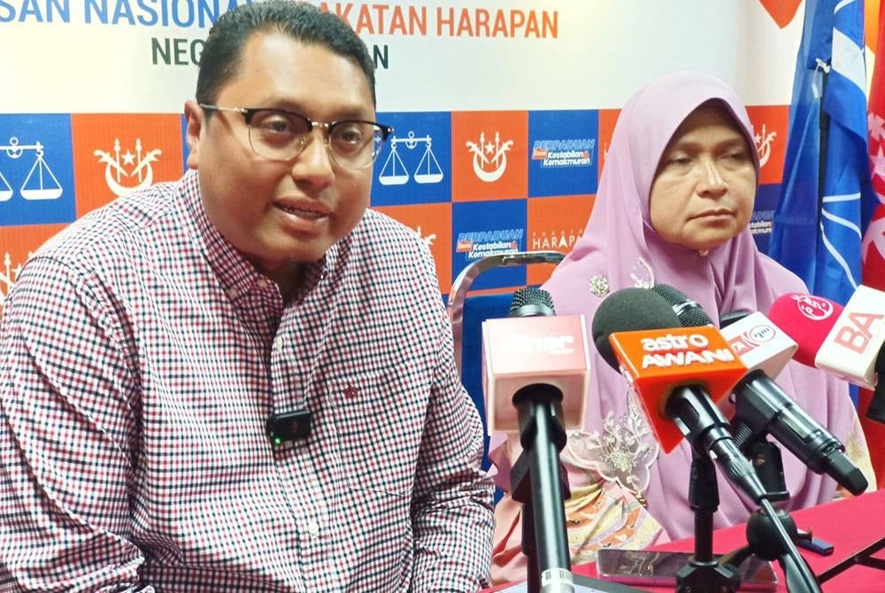Mohd Syahbuddin and Dr Hafidzah during a press conference at the Kelantan Umno Office on Sunday - FILE PIX 