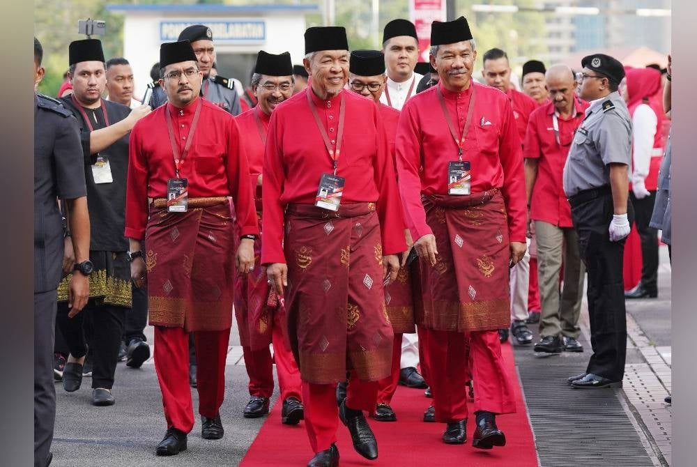 Zahid with his number two Datuk Seri Mohamad Hasan dan secretary general Datuk Dr Asyraf Wajdi Dusuki during Umno's 2023 AGM World Trade Centre Kuala Lumpur (WTCKL).