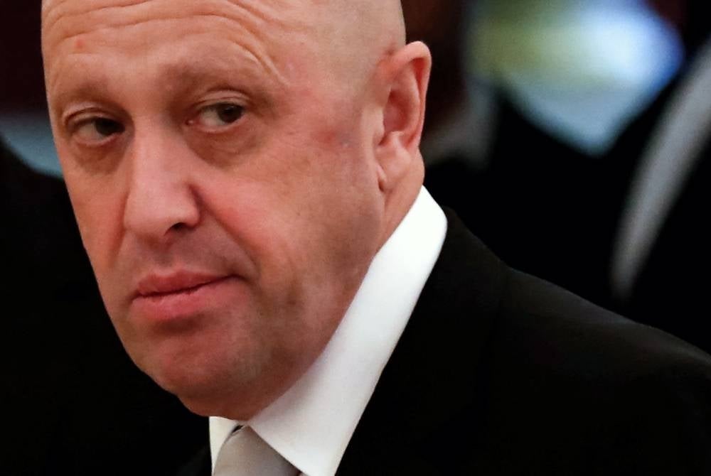 (FILES) This picture taken on July 4, 2017 shows Russian businessman Yevgeny Prigozhin prior to a meeting with business leaders held by Russian and Chinese presidents at the Kremlin in Moscow. (Photo by Sergei ILNITSKY / POOL / AFP)