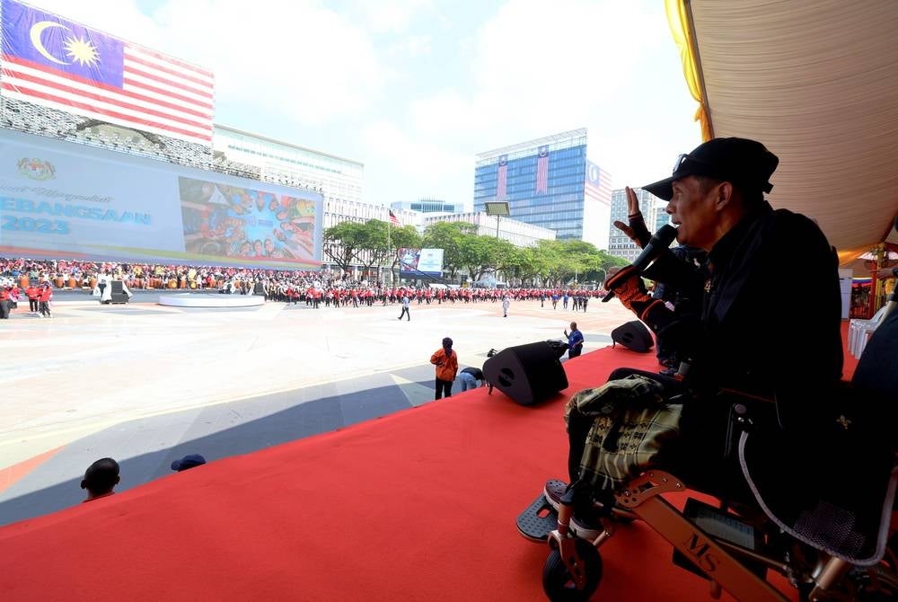Being disabled has not prevented artistic and concept director of the National Day 2023 celebration, Rosnan Nordin, from carrying out his duties to the best of his ability and ensuring that all the acts planned for the event go off without a hitch. - BERNAMA