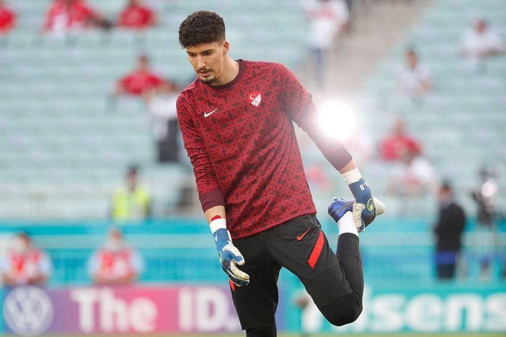 Turkey's goalkeeper Altay Bayindir warms up before the Uefa Euro 2020 Group A football match between Turkey and Wales at the Olympic Stadium in Baku on June 16, 2021. - Photo by Valentyn Ogirenko / Pool / AFP