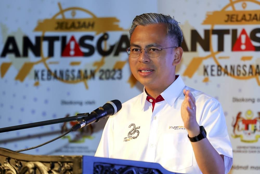 Communications and Digital Minister Fahmi Fadzil delivering a speech at the opening ceremony of the Sarawak-level 2023 National Anti-Scam Tour Programme today. - Photo by Bernama