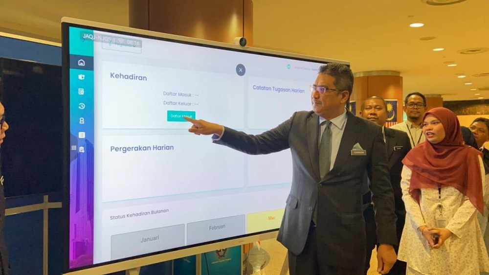 Ahmad Terrirudin, clad in a black suit, arrived at his office at 8.15am and was greeted by the Solicitor General II Datuk Almalena Sharmila Johan and the heads of Attorney-General Chamber (AGC) divisions.