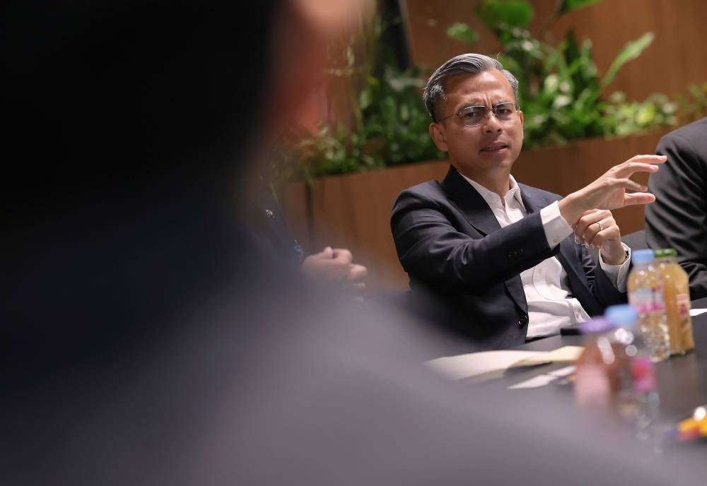 Communications and Digital Minister Fahmi Fadzil leading Malaysian delegation in discussion with South Korean games company, NX3 Games for possible collaborations in the gaming industry. - BERNAMA PIX