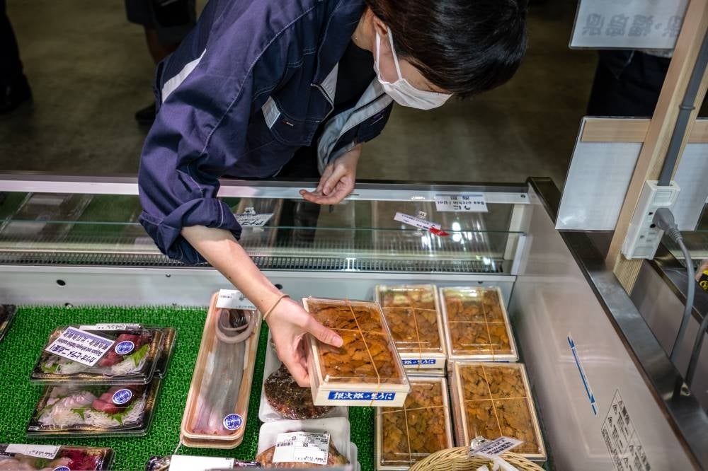 Japanese exports of seafood and processed seafood products - excluding ornamental fish - to Malaysia totalled 3.5 billion yen (RM111 million) in 2022. - FILE PIX by AFP