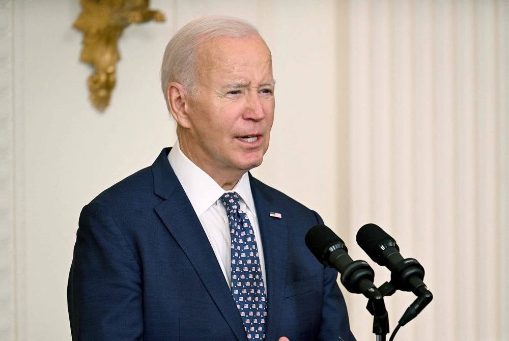 US President Joe Biden speaks prior to presenting the Medal of Honor to former US Army Captain Larry Taylor, in the East Room of the White House in Washington, DC, on Sept 5. (Photo by Jim WATSON / AFP)