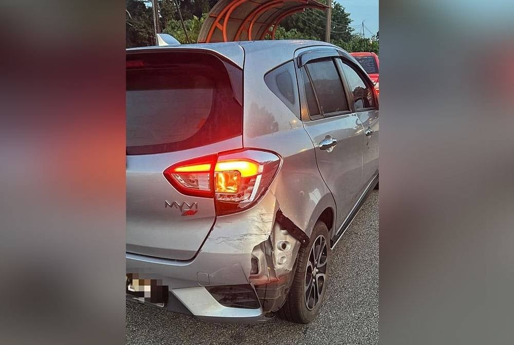 The Perodua Myvi was driven by a teacher in an accident after stopping to avoid hitting a child crossing the road.