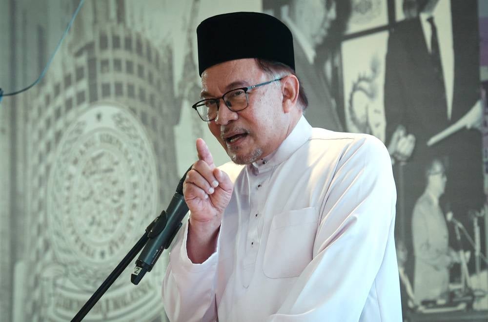 Prime Minister Datuk Seri Anwar Ibrahim delivering a speech at the launching of Tabung Haji’s 60th anniversary celebration at Menara TH. - Photo by Bernama